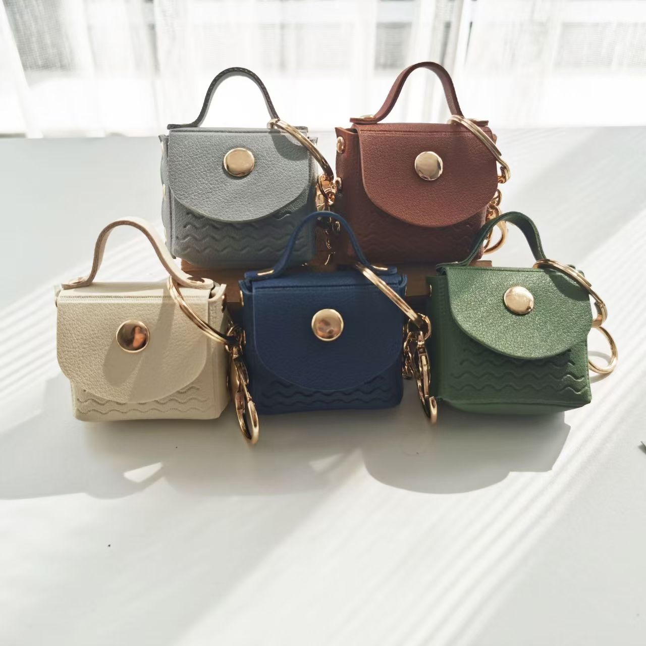 Mini leather wavy keychain bag