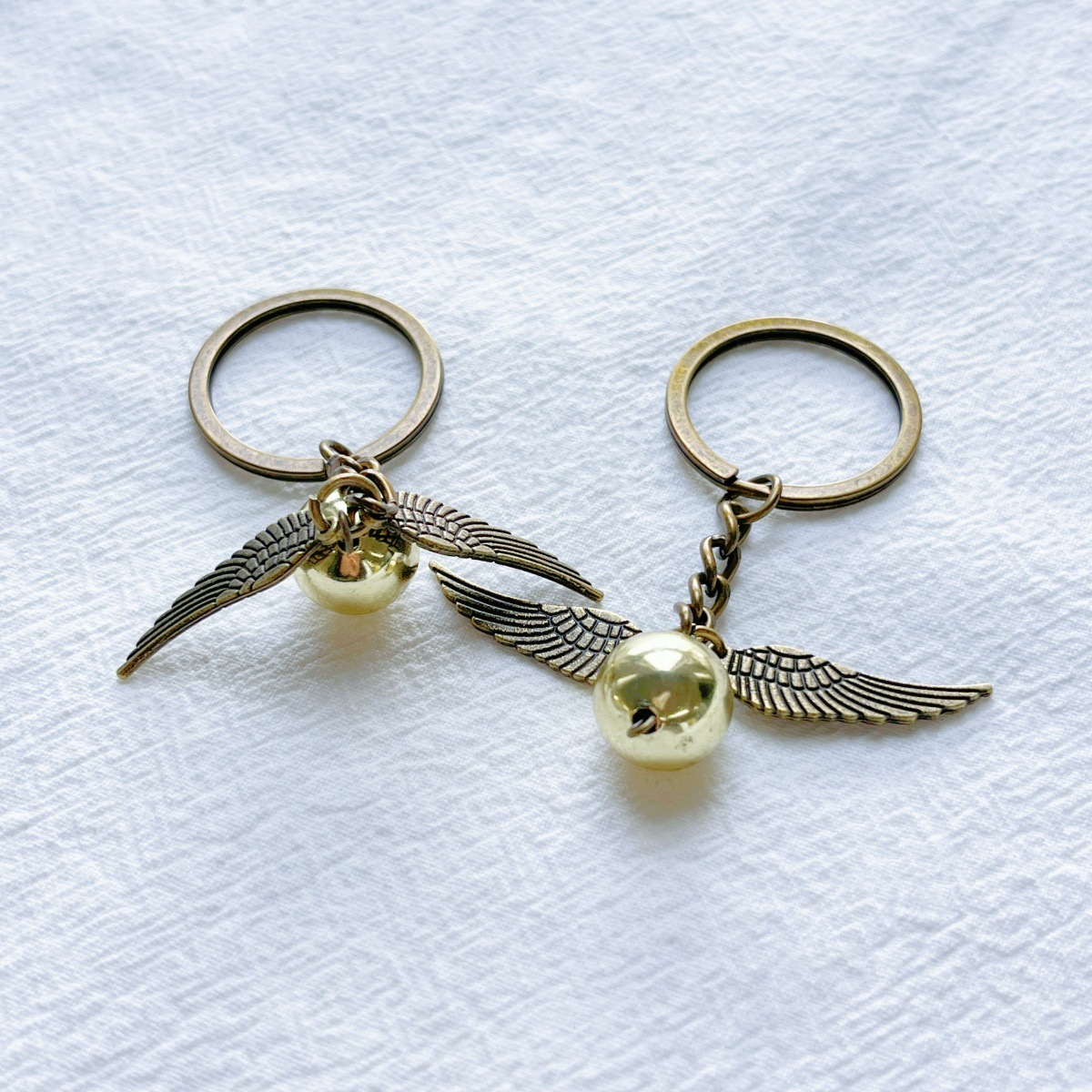 Harry Potter Keychain with Golden Snitch & Deathly Hallows Charm