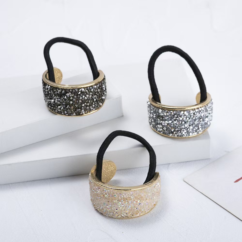 Semi-circular diamond studded headband with ponytail tie