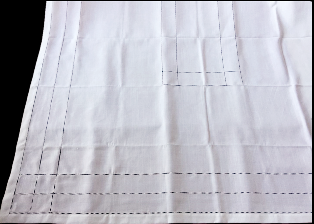 Linen look tablecloth with hemstitch border