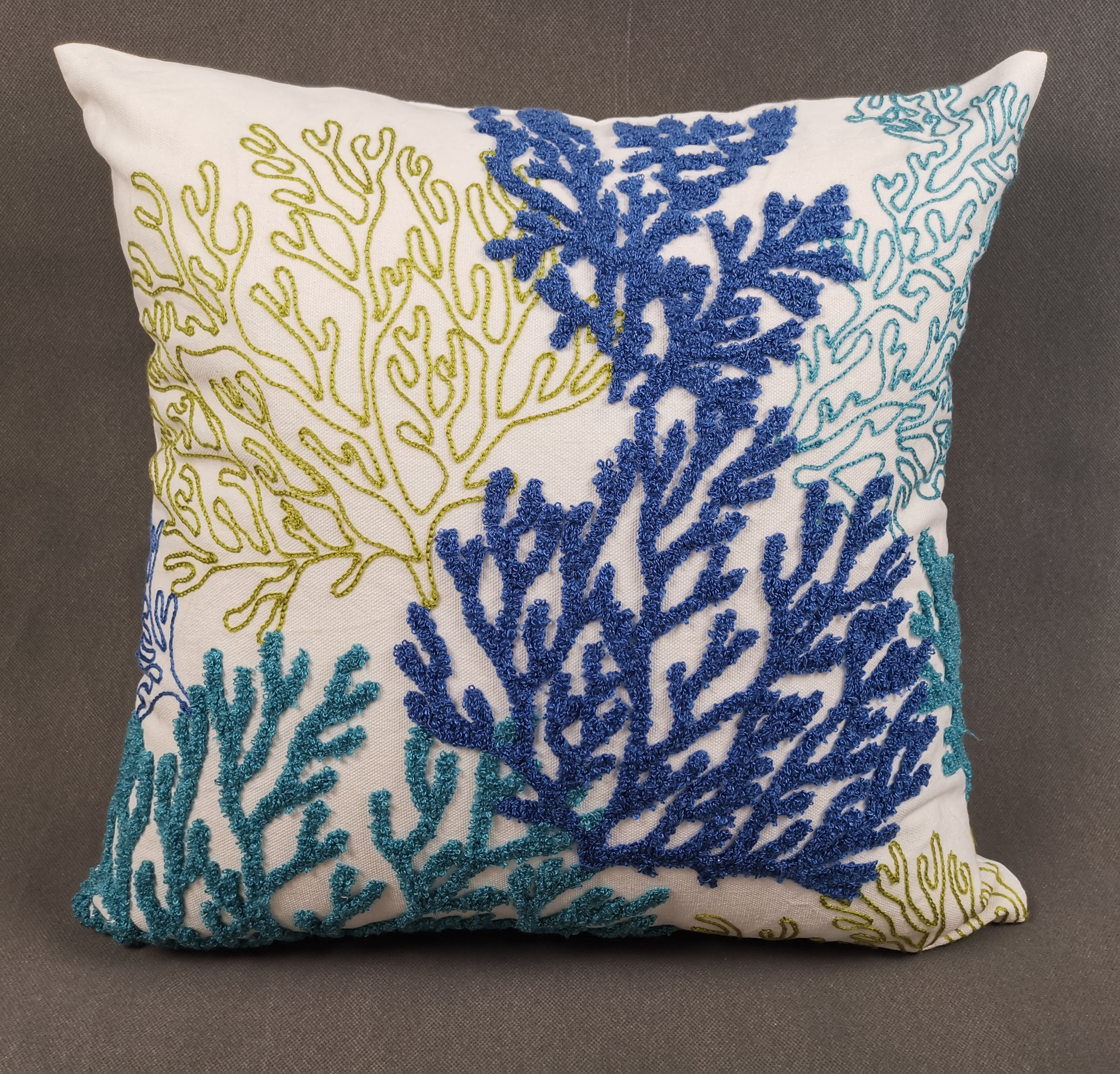 Towel and chain embroidery cushion with coral pattern