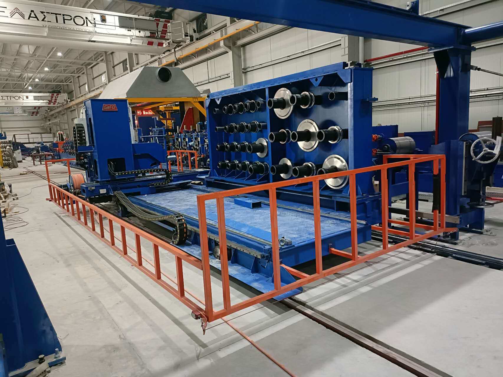 Robotic Roll Changing System for Pipe Production