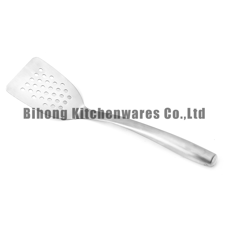 Slotted turner with hollow handle