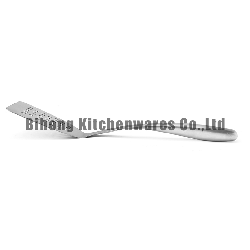 Slotted turner with hollow handle