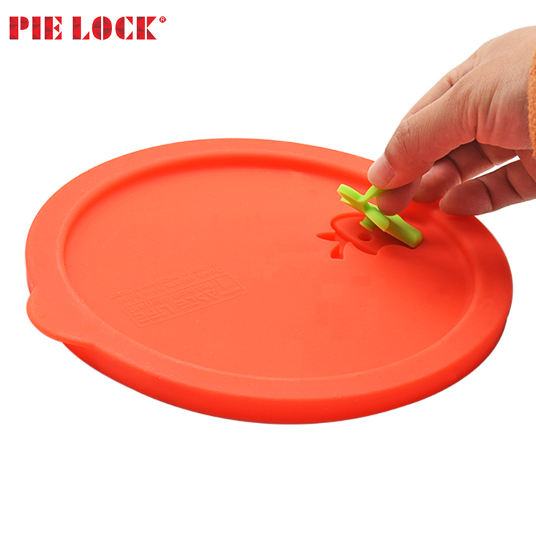 Glass food storage container with colorful silicone lid