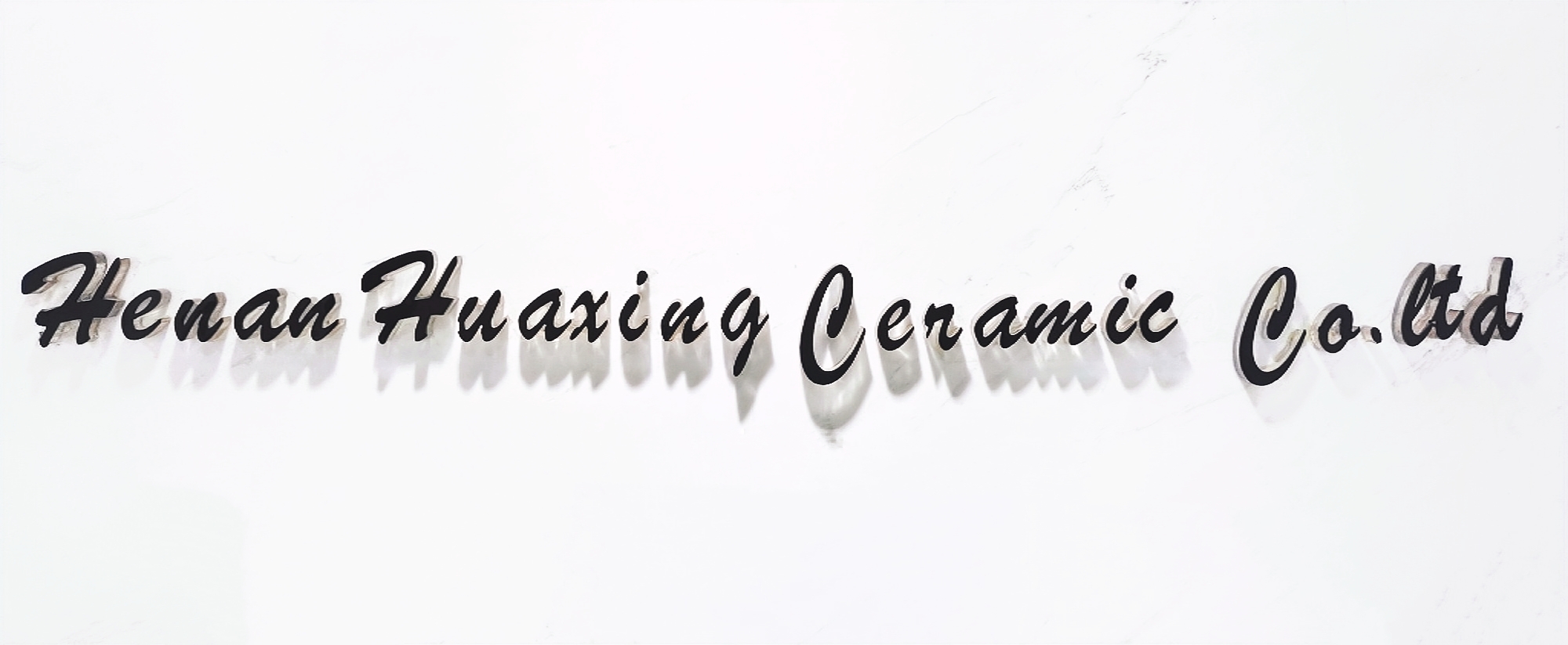HENAN HUAXING CERAMIC CO.LTD logo