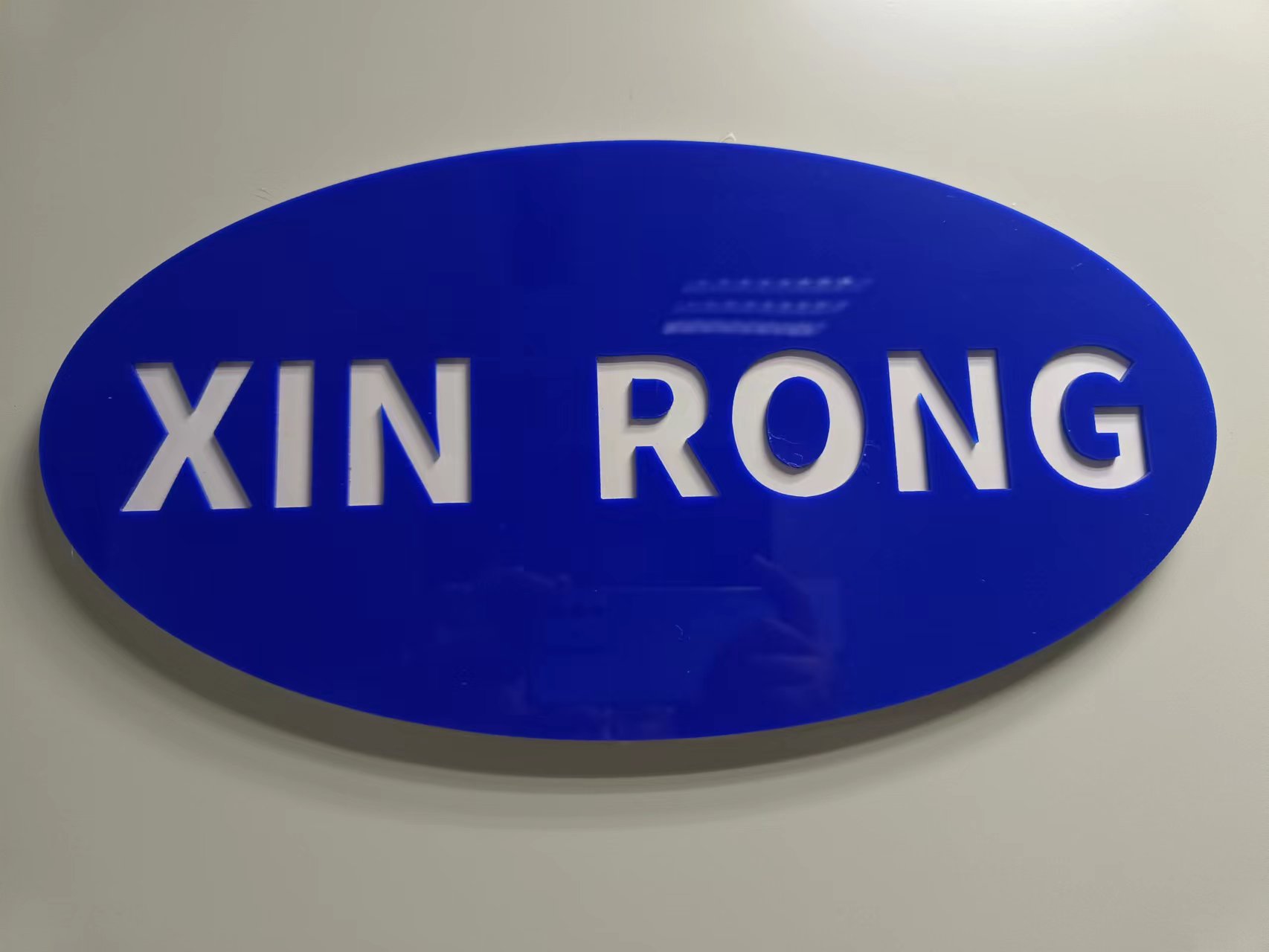 WEIHAI XINRONG IMP & EXP CO LTD logo
